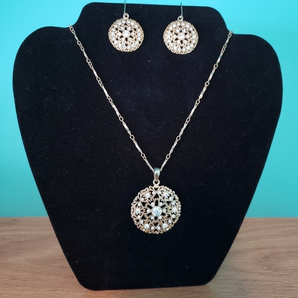 Matching gold earring and necklace set